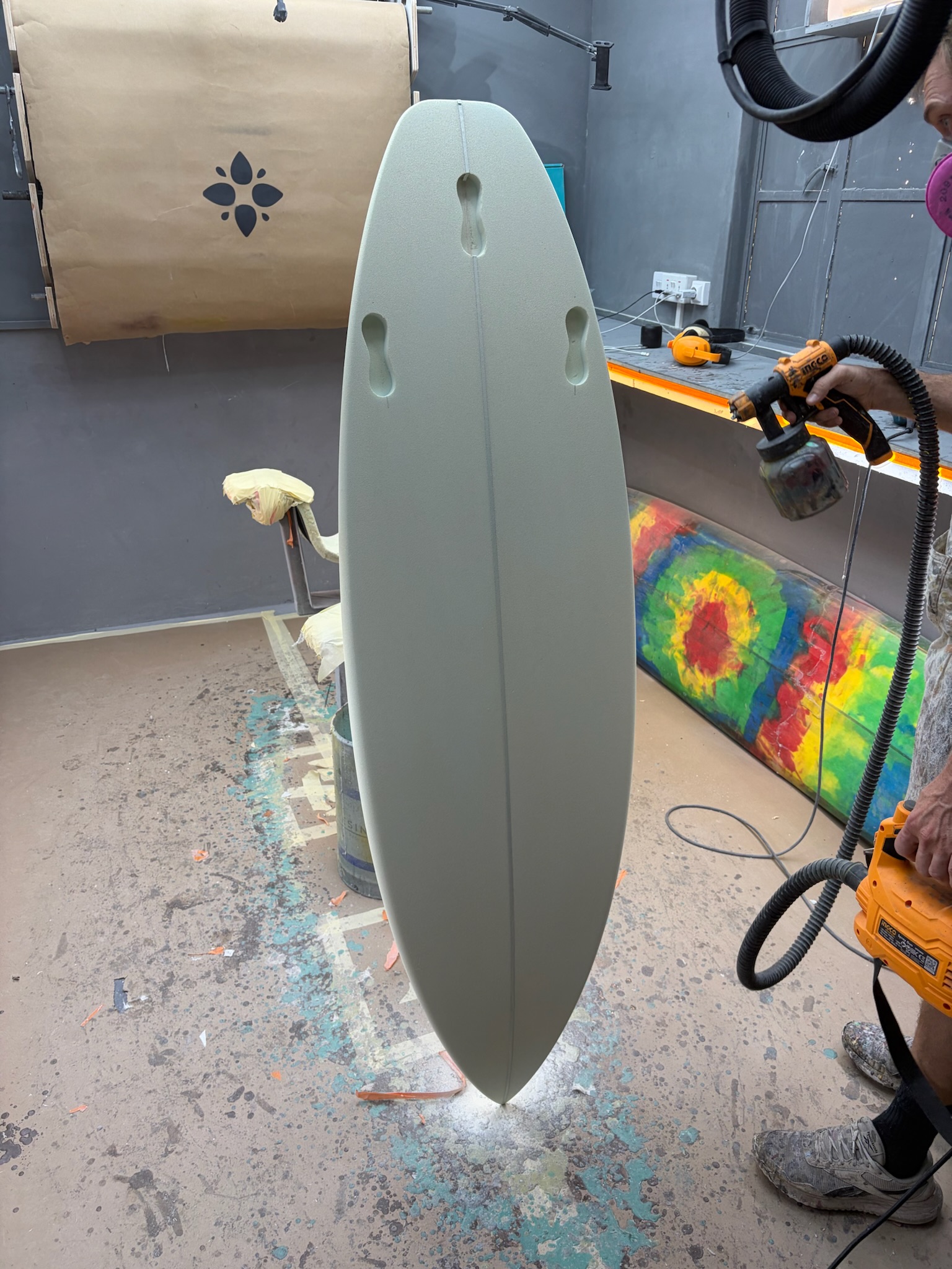 The board hung and sprayed with a base coat