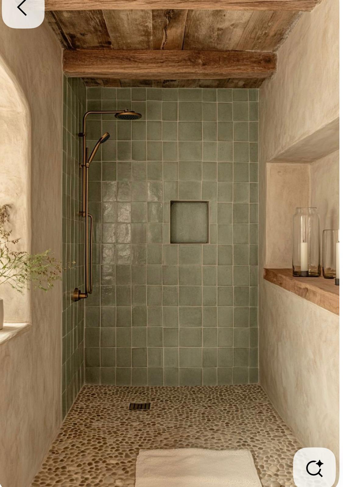 Sage green zellige shower with pebble stone floor