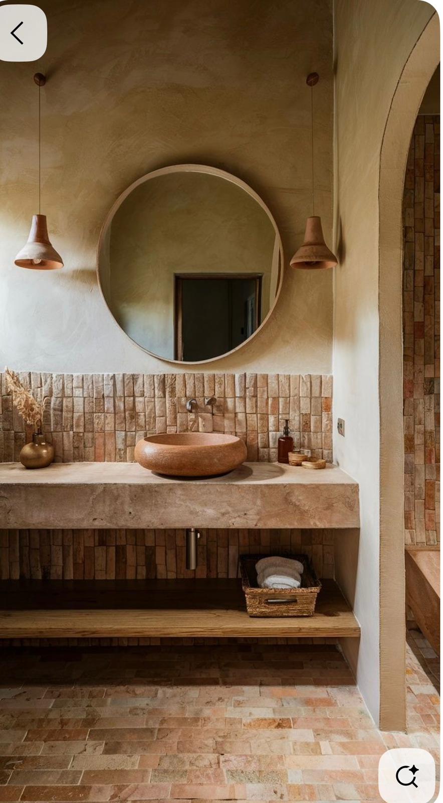 Terracotta tile vanity with round mirror and pendants