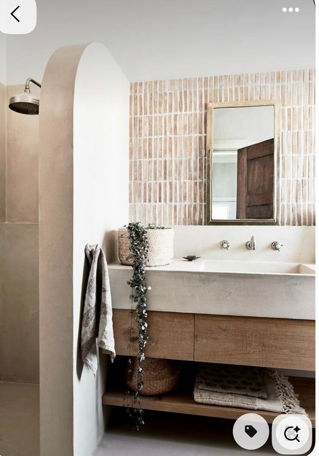 Wooden drawer vanity with terracotta brick tiles