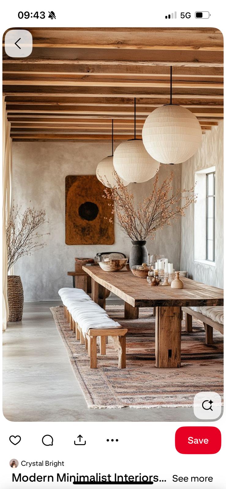 Wabi-sabi long table under beam ceiling