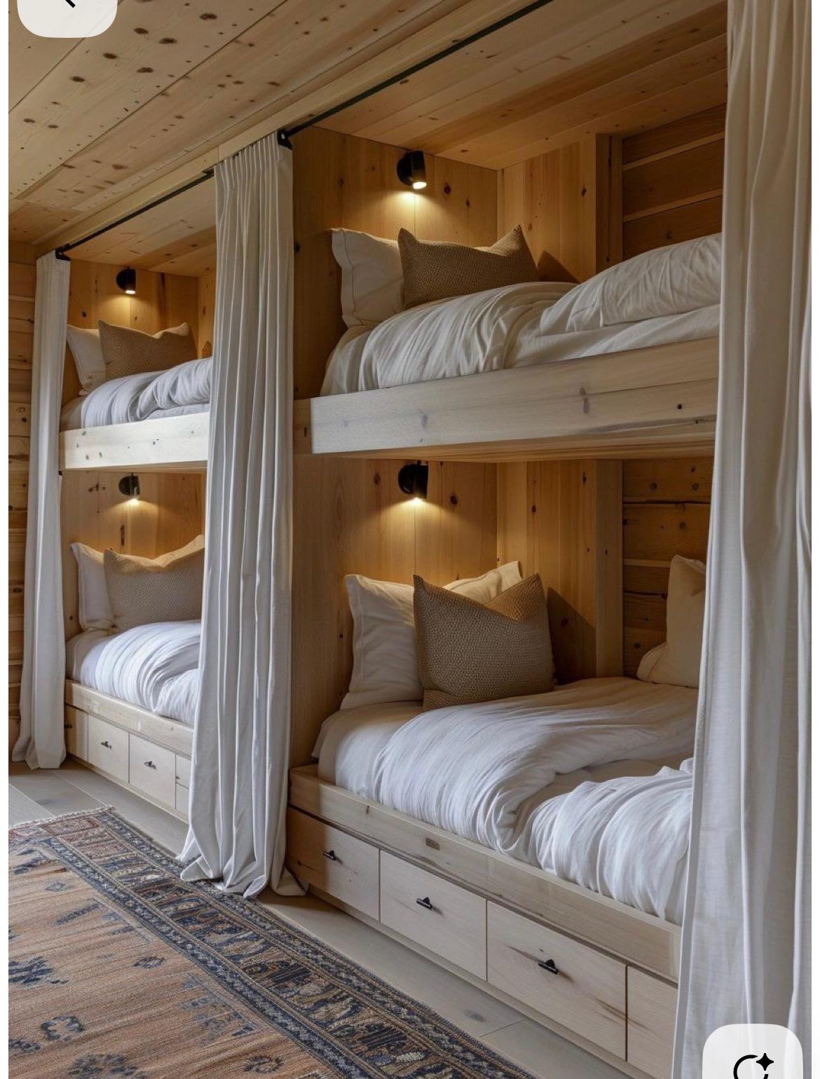 Built-in bunk beds with privacy curtains and storage