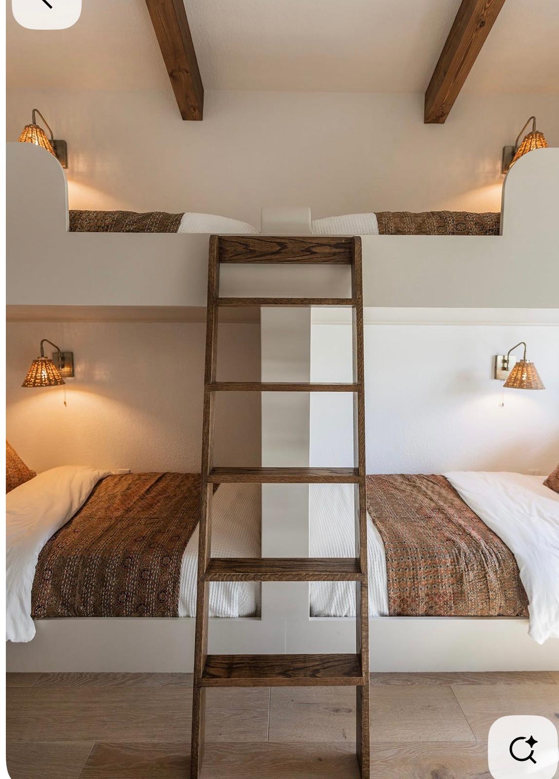 Four-bed bunk with ladder and textured quilts