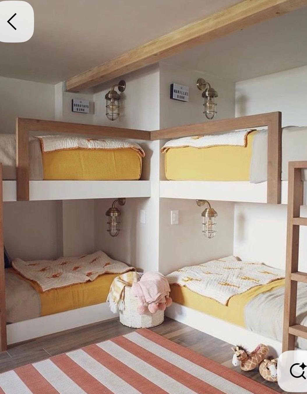 L-shaped four bunks with striped rug