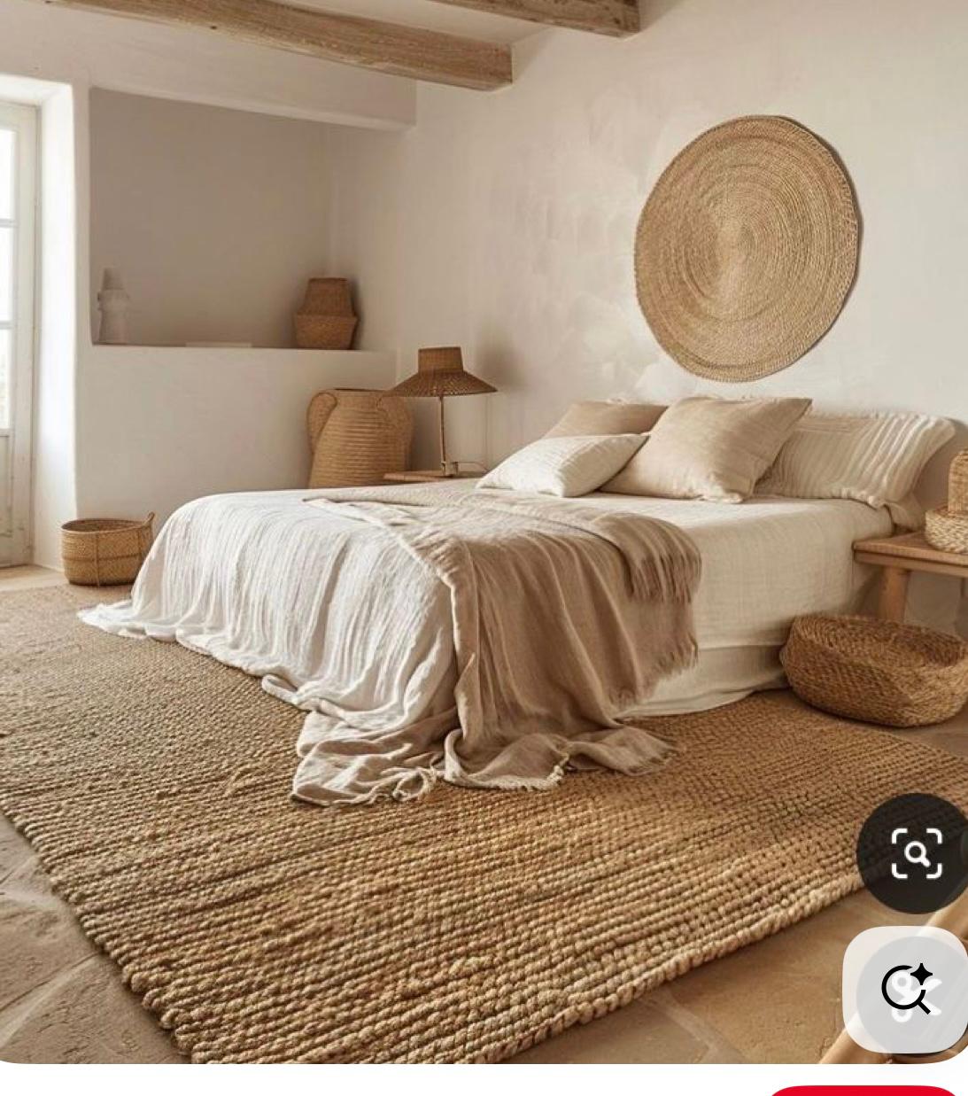 Wabi-sabi bedroom with jute rug and woven wall art