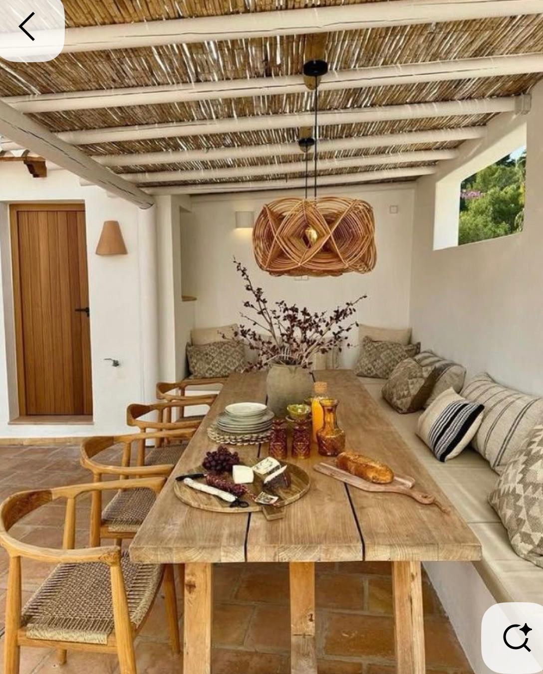 Covered dining with built-in bench and rattan pendant