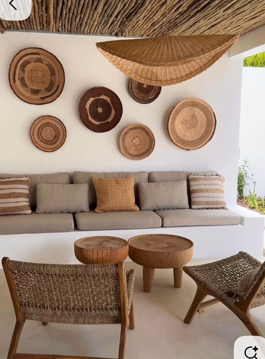 Mediterranean lounge with woven wall baskets