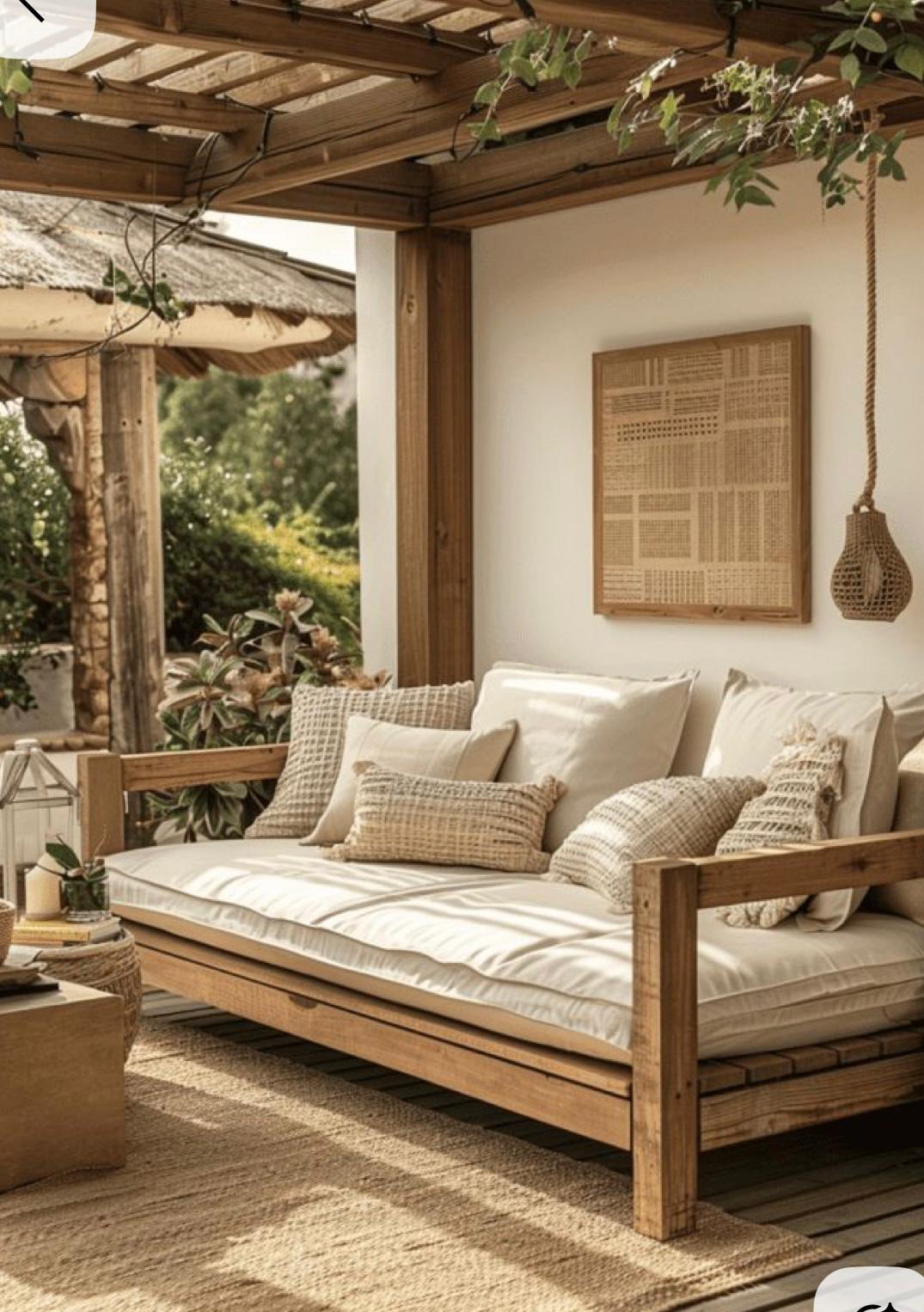 Wooden daybed sofa under pergola