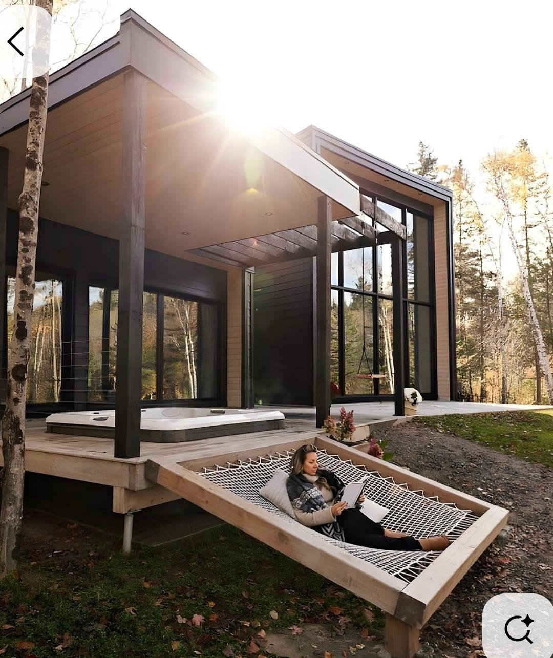 Hot tub and hammock deck at a modern cabin